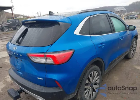 2020 Ford Escape Titanium z USA, uszkodzony, nr VIN 1FMCU9J96LUB97509